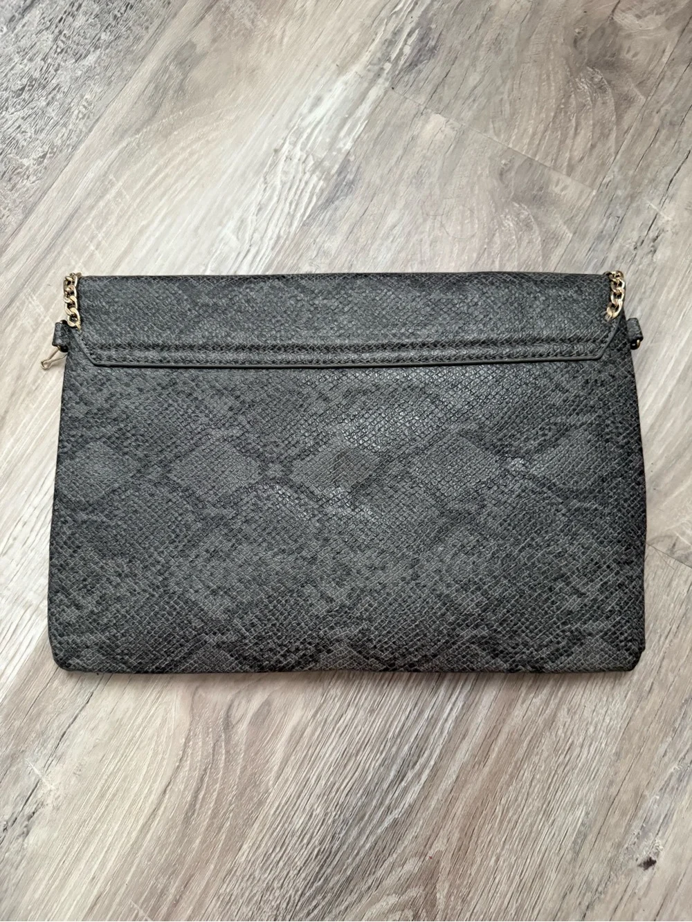 Gray clutch with gold studs